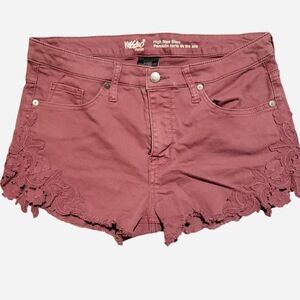faded burgundy cut off shorts with floral lace side embellishments